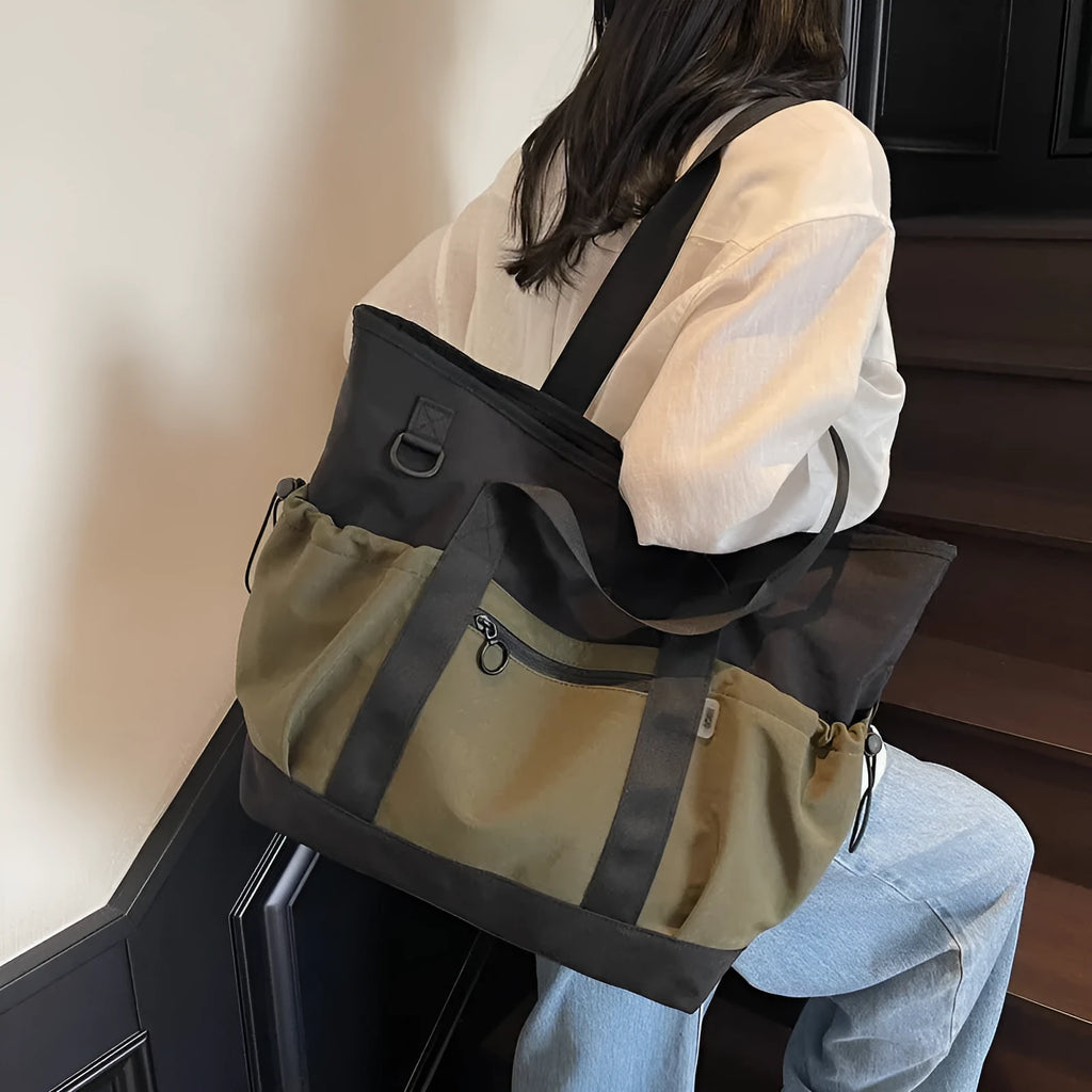 Women's lightweight Oxford cloth travel bag for yoga and fitness in grey colour with letter pattern.