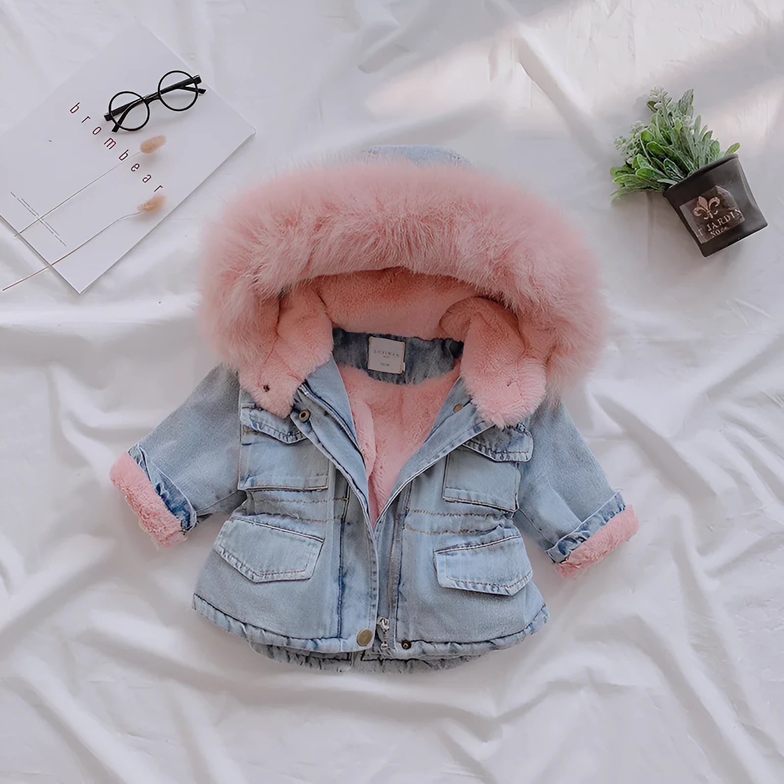 Blue denim coat for a girl with an attached hood and velvet lining.