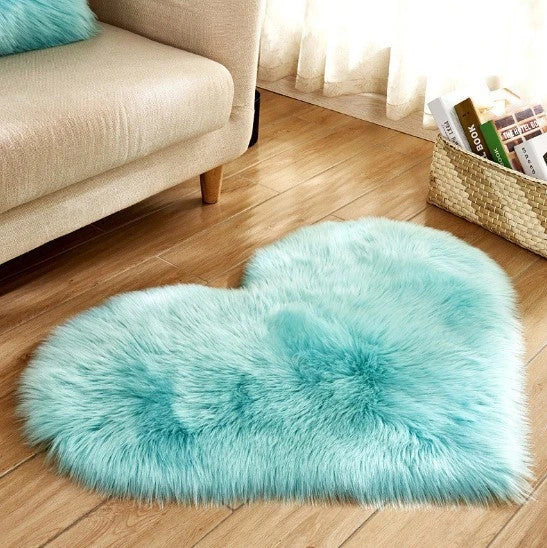 Soft and plush heart-shaped rug in various colors, perfect for cozy home decor