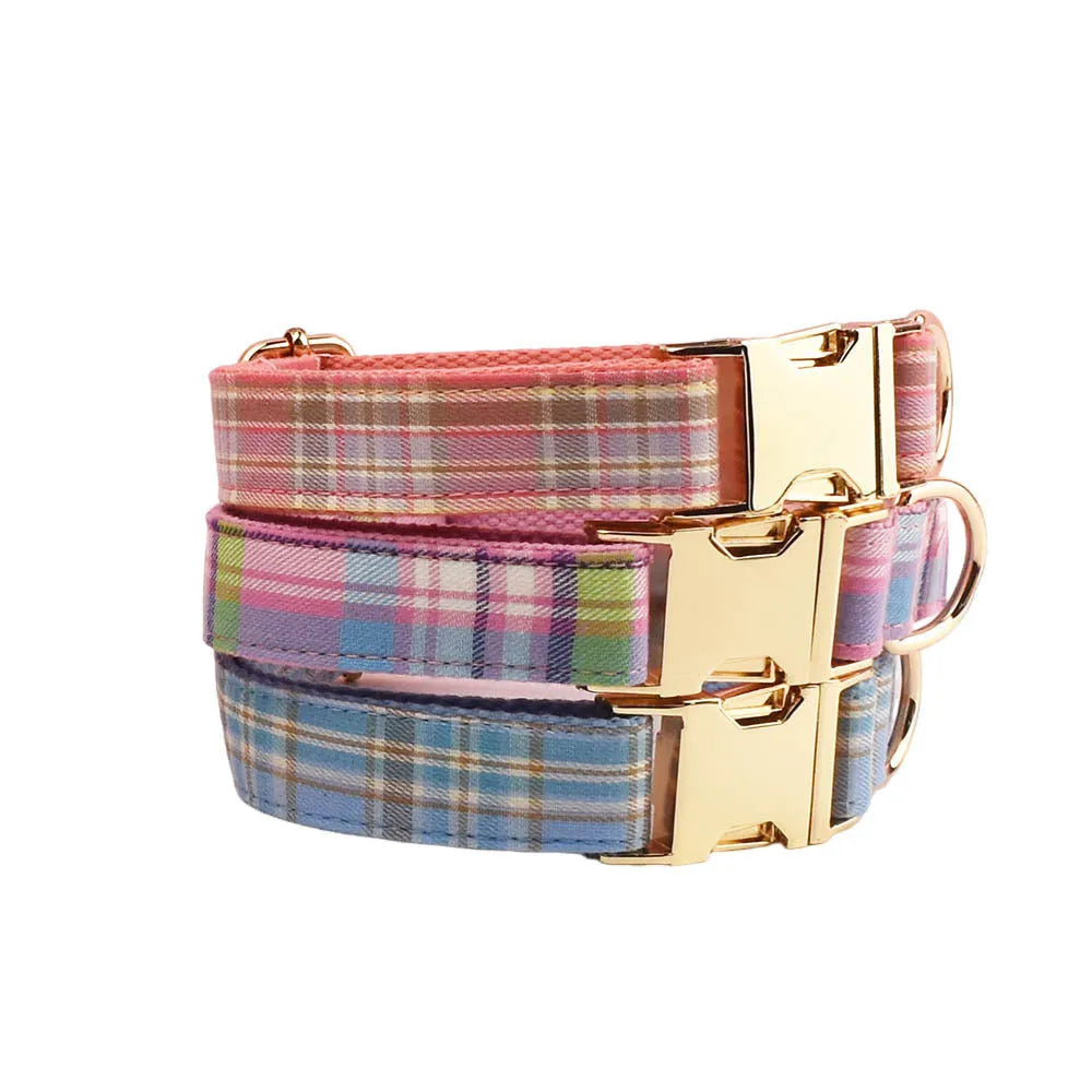 Four-piece cloth dog accessory set showing collar, leash, vest, and bow for coordinated pet styling