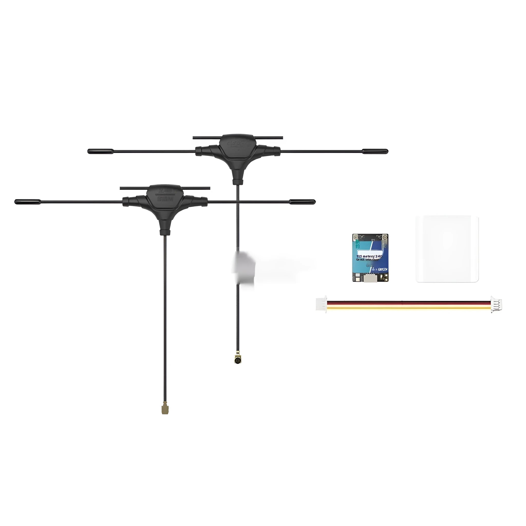 Gemini ELRS dual-frequency FPV receiver with two T-shaped antennas and installation accessories on a table.