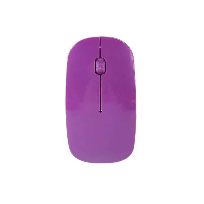 Wireless computer mouse with USB receiver available in seven colour choices on desk