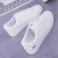 Women's PU leather heart flats shoes with colourful beads and stainless steel pendant on white background