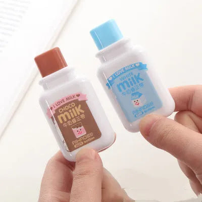 Cute bottle-shaped correction tape dispenser with decorative pattern showing 6m smooth adhesive tape.