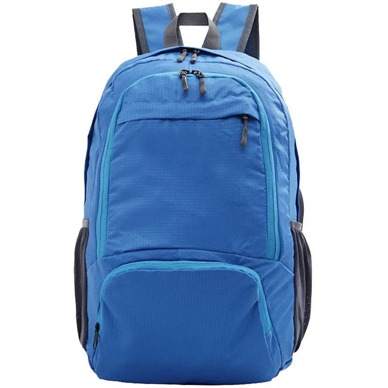 A 26-inch waterproof Oxford cloth backpack in a solid colour, shown folded and unfolded.