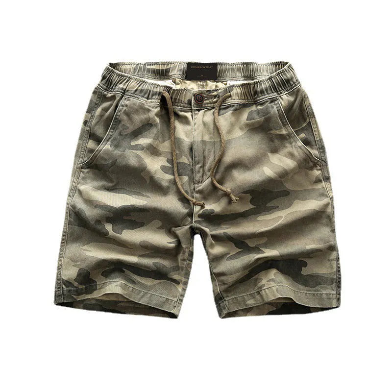 Cotton workwear shorts in camouflage pattern with zip fly and mid-waist fit