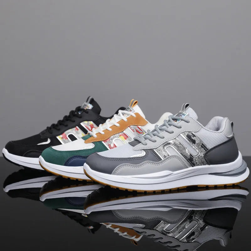 Men's mesh casual sports shoes in white green, black, and grey colours with shallow cut design