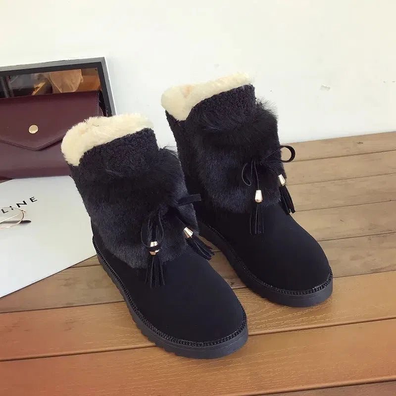 Mid-length women's snow boots with front zip, microfiber upper, chunky mid heel, black or grey, sizes 35-40
