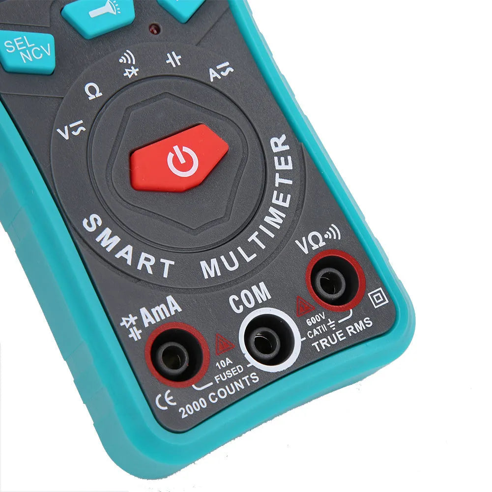 Green PTM automatic digital multimeter with LED display on a workbench