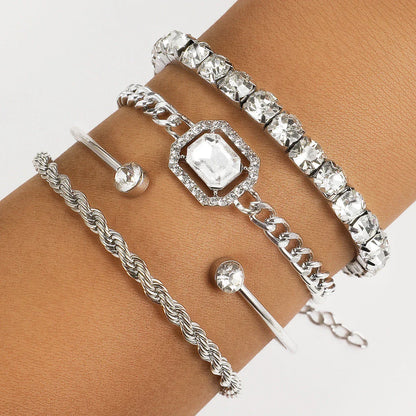 4-piece crystal bracelet set with bohemian-inspired design, featuring adjustable nickel-free alloy construction and sparkling rhinestones