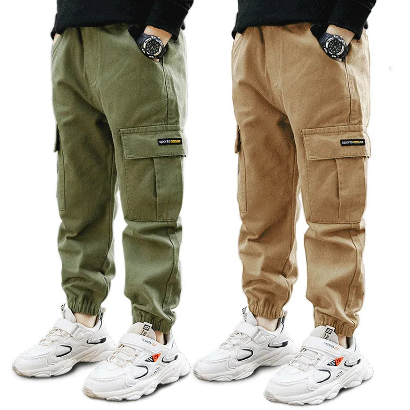 Boys' casual cotton trousers in army green, shown laid flat with size label visible.