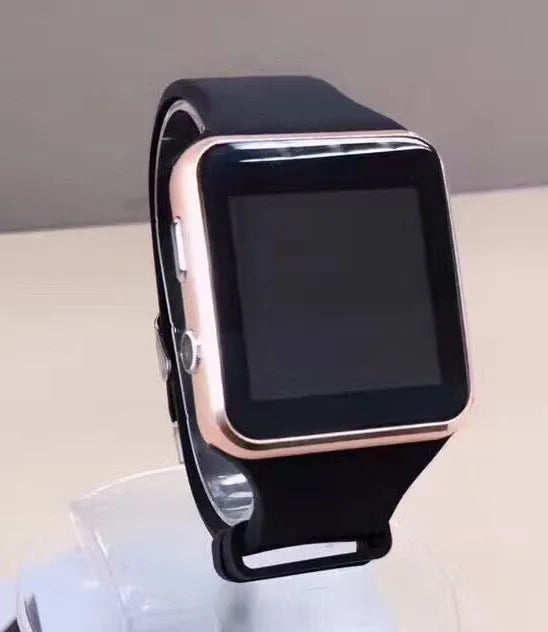 Black smart watch with 1.54-inch touch screen and silicone strap on a wrist.