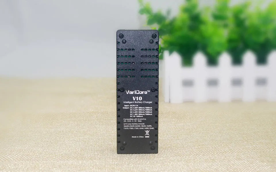 V10 universal battery charger for 18650, 26650, AA and AAA with USB boost output and LED indicator
