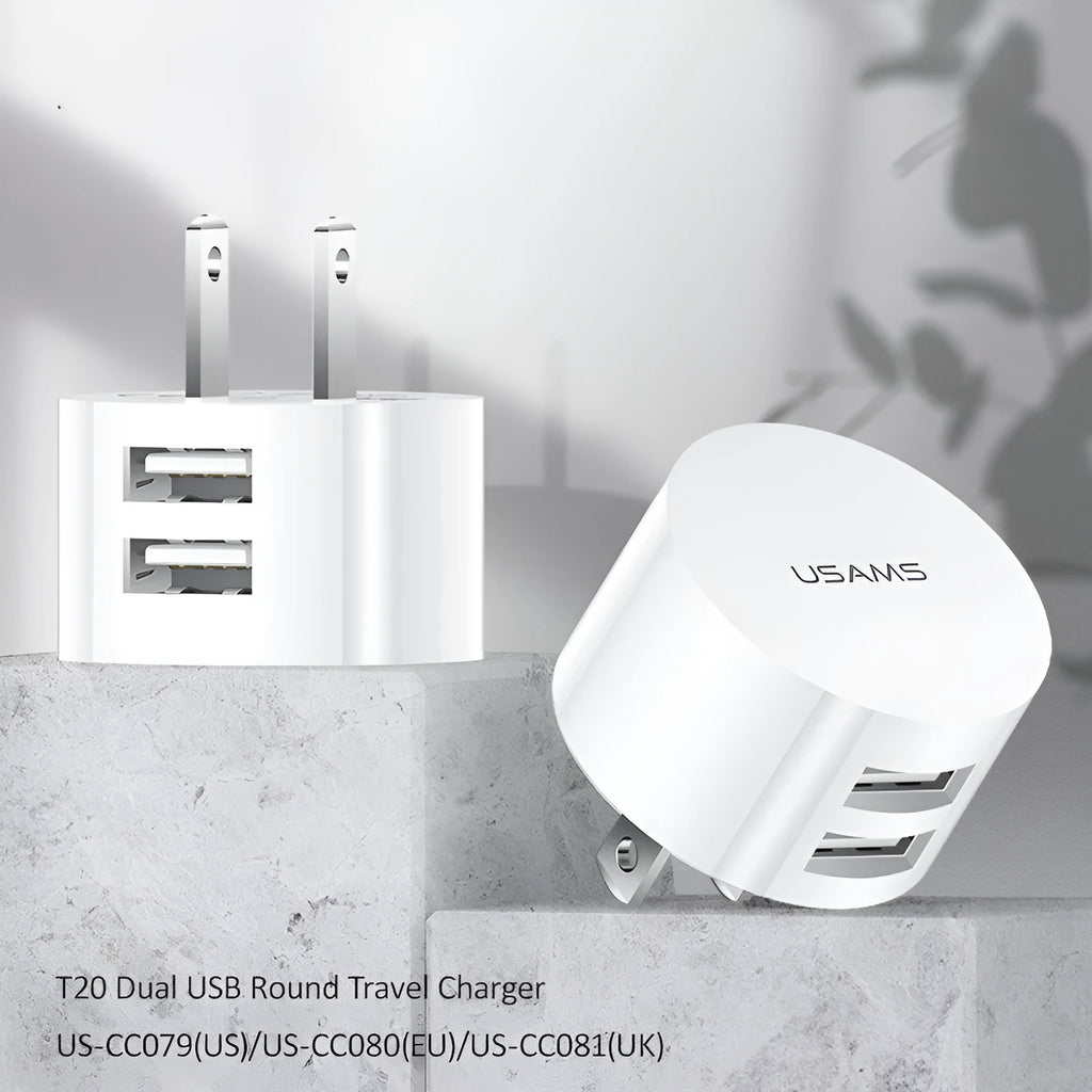 White portable universal dual USB charger with EU, UK and US adaptor heads for international travel