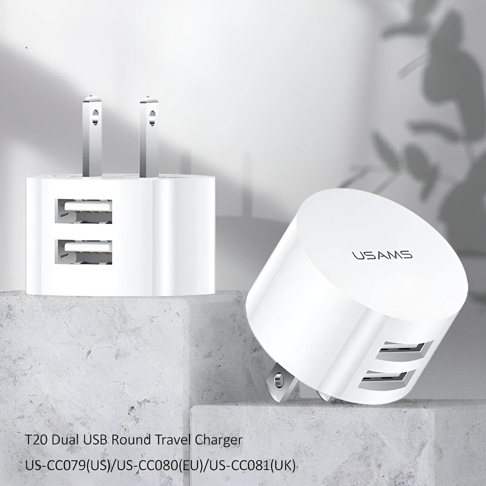 White portable universal dual USB charger with EU, UK and US adaptor heads for international travel