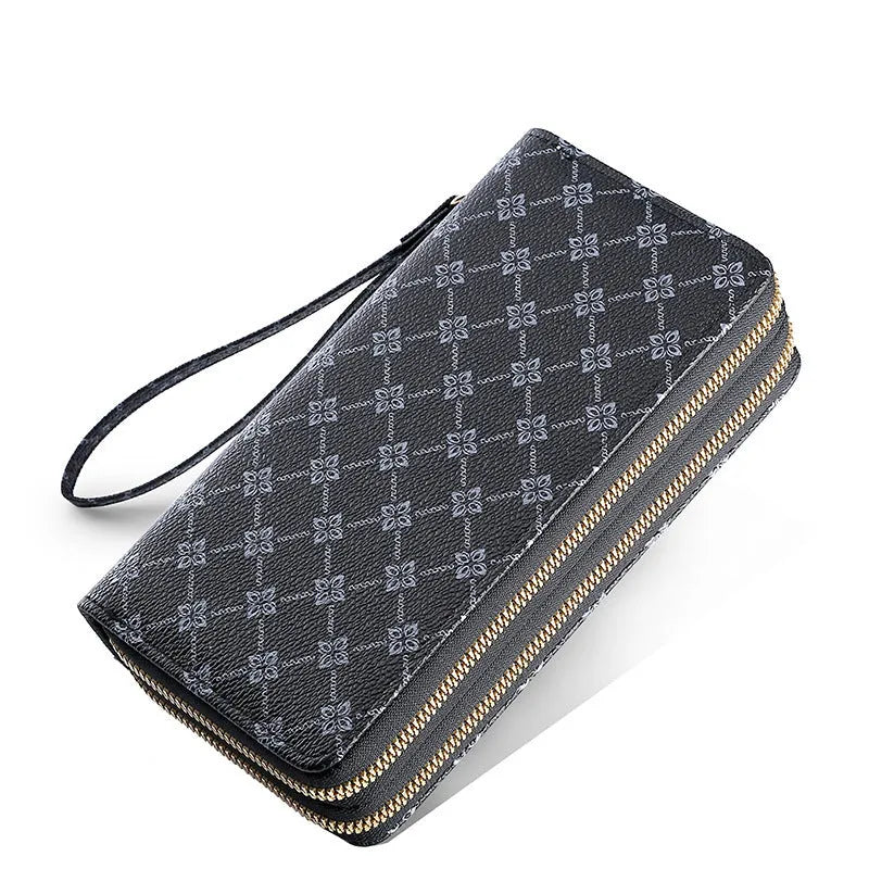 Long PU leather wallet clutch with zip closure and retro print decoration showing internal compartments