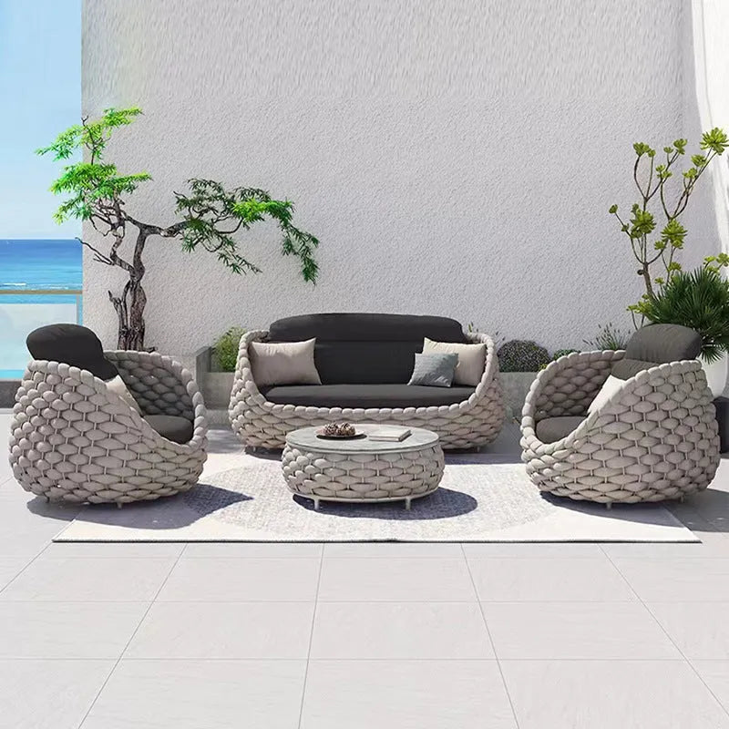 Outdoor patio lounge sofa coffee table set with PE rattan weave, aluminium frame, and high-density sponge cushions.