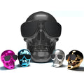 Limited Edition Skull-themed portable Bluetooth speaker in choice of six colours on a table.