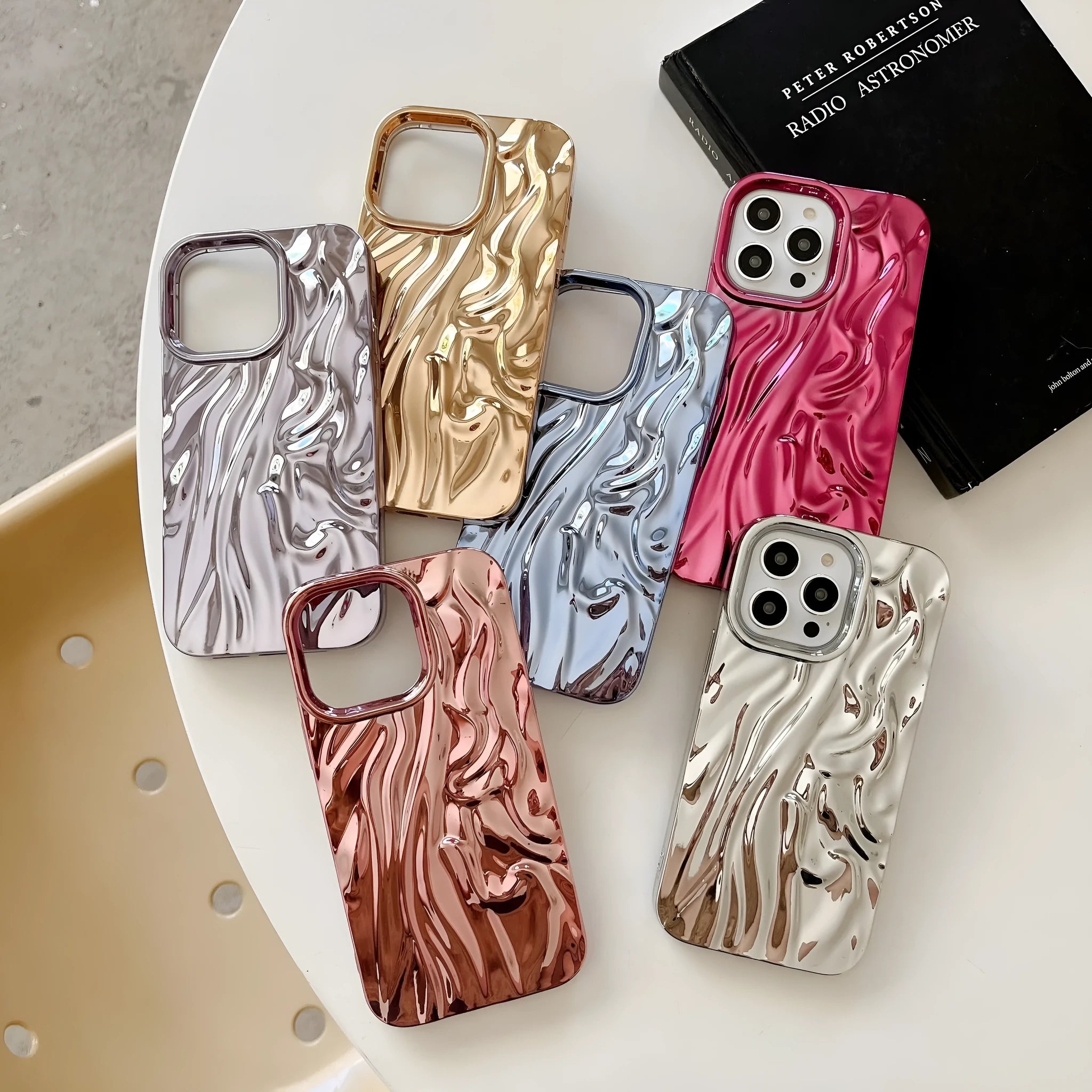 Soft TPU iPhone case with a textured pleated pattern in a rose red electroplated colour.