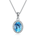 Geometric sterling silver jewellery set with blue topaz gems including earrings, ring, pendant and necklace
