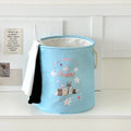 Foldable cotton laundry basket in mint green west highland pattern showing large capacity and collapsible design