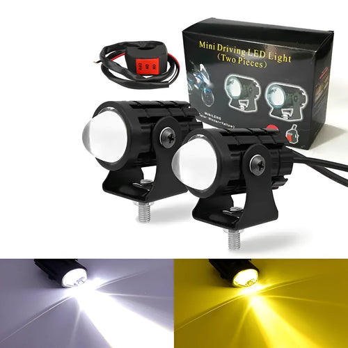 Motorcycle spotlight with dual-colour lens, aluminium housing, showing white and yellow light modes.