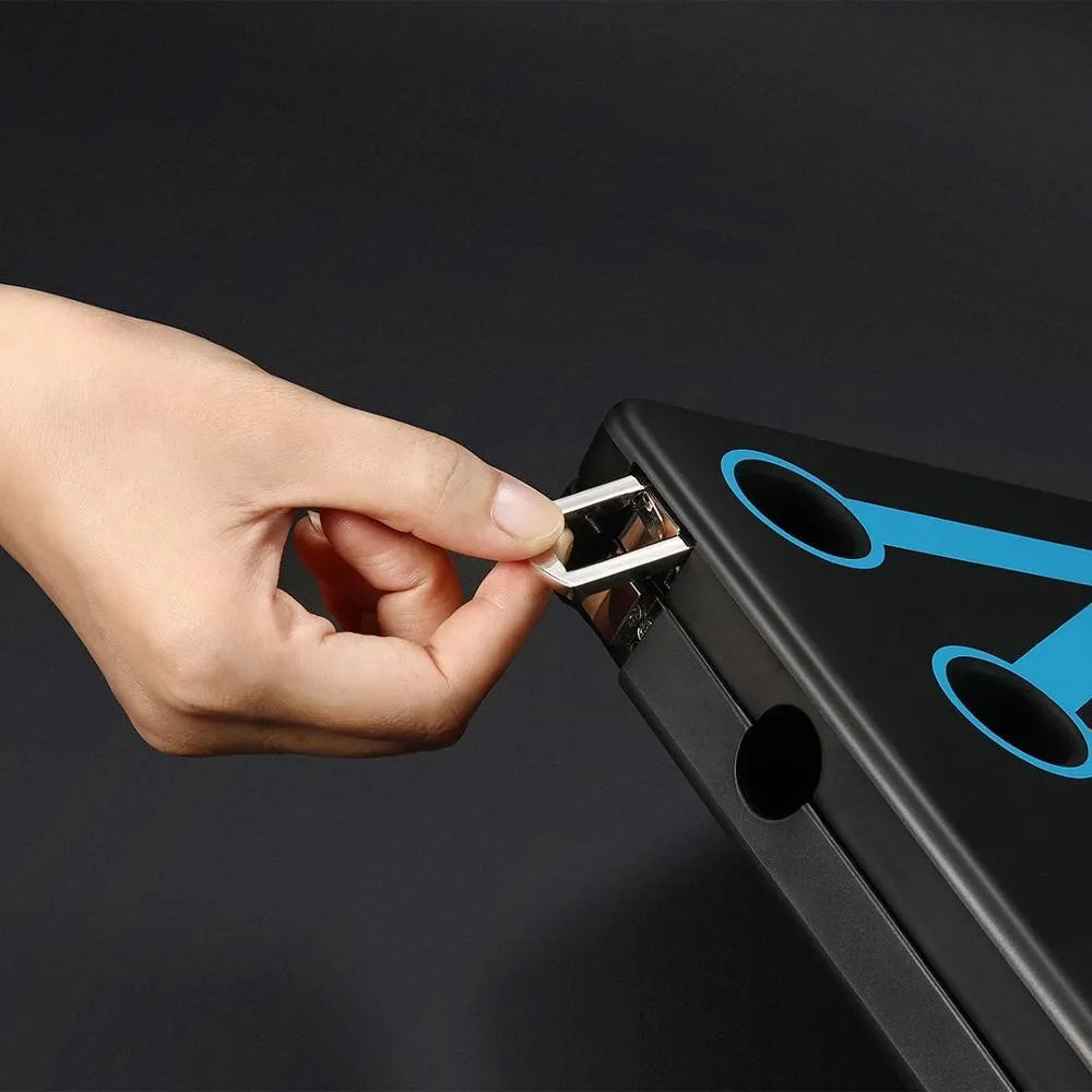 Yunmai black push up stand with two armrests and main board on a wooden floor