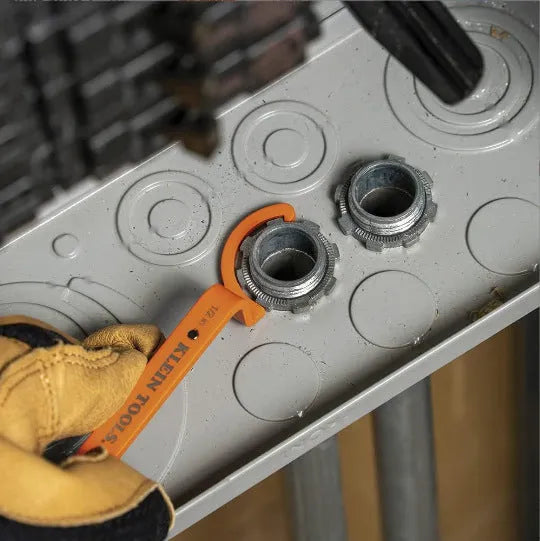 Three magnetic crescent wrenches with orange, grey and black handles showing suction and locking features