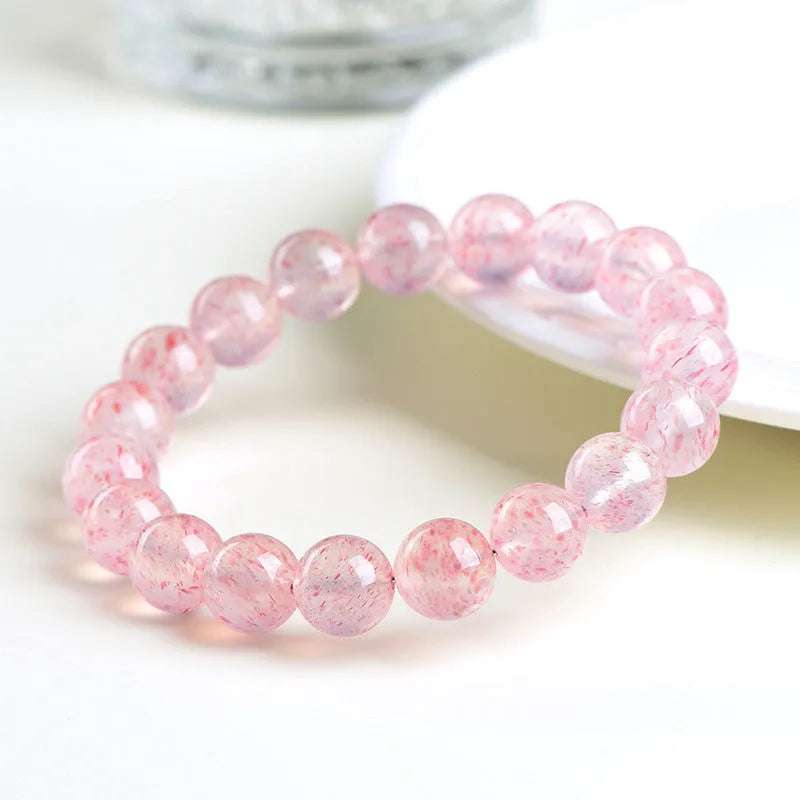 Natural white water strawberry quartz crystal bracelet with 10–10.8mm round beads.