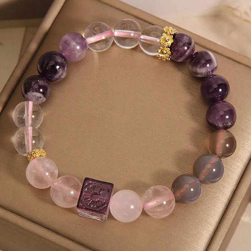Purple women's amethyst crystal bracelet with rhinestone details showing 10mm size