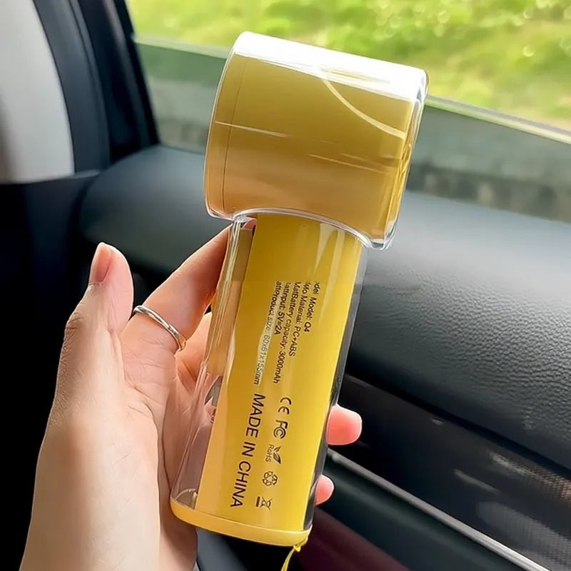 Handheld cooling fan with ice compress function in black, white, or yellow colours