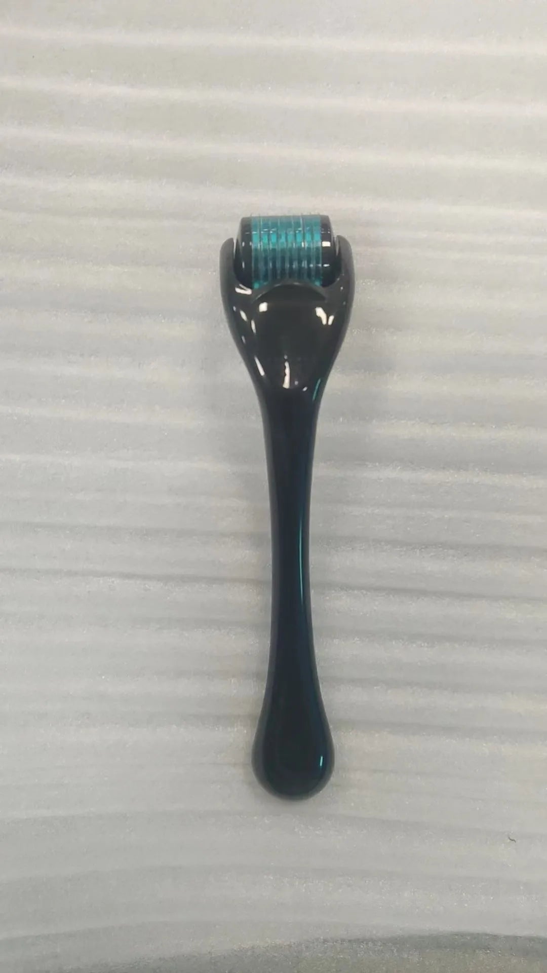 540 needle micro needle roller derma roller with black handle and purple wheel