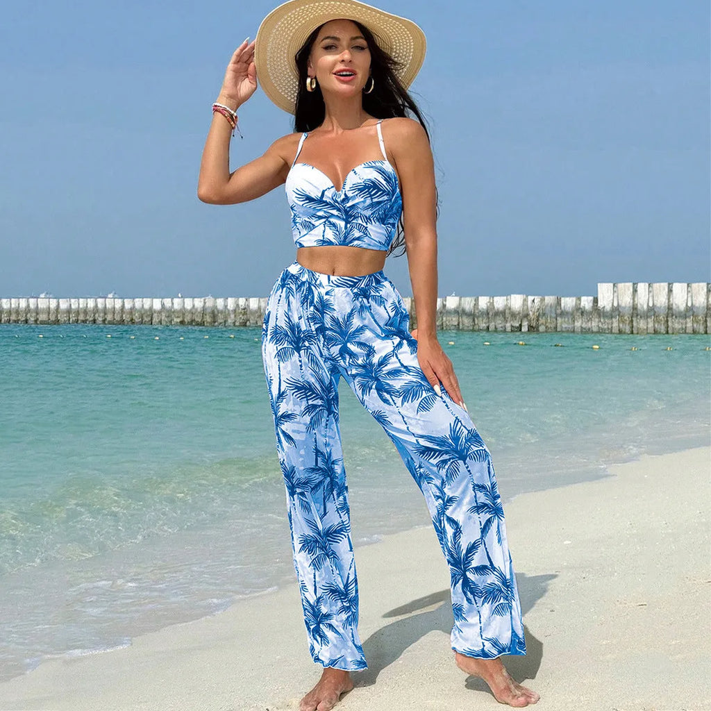 Women's bikini three-piece suit with printed pattern, available in black, blue, and emerald green colours