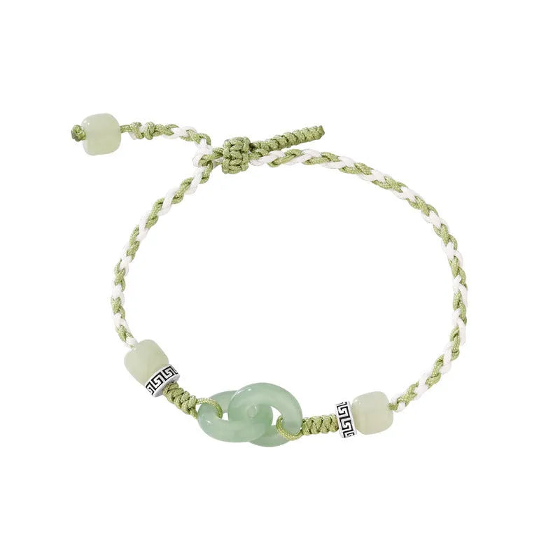 Green copper bracelet with ethnic peace buckle design and jade double ring strap