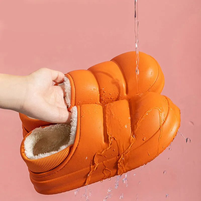 Yellow waterproof EVA garden slippers with a plush lining and textured non-slip sole.