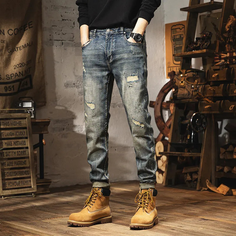 Men's vintage blue loose straight-leg jeans with fleece lining and a drawstring waist closure.