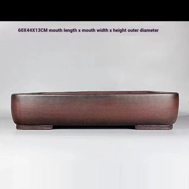 Handmade antique rectangular purple clay flower pot showing its dimensions and natural finish.