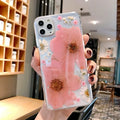 Floral TPU iPhone case with large pink flower design on iPhone 15 Pro