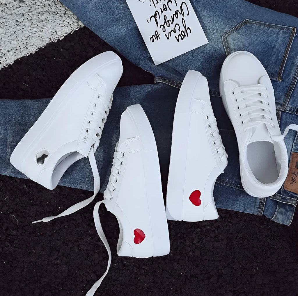 Women's PU leather heart flats shoes with colourful beads and stainless steel pendant on white background