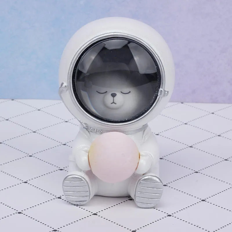 Animal-themed resin night light projecting starry sky lighting effect on surface