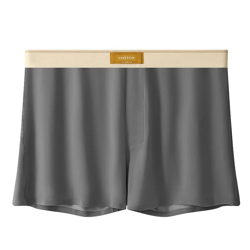 Pack of three pairs of men's solid colour loose fit ice silk nylon underwear on a white background.