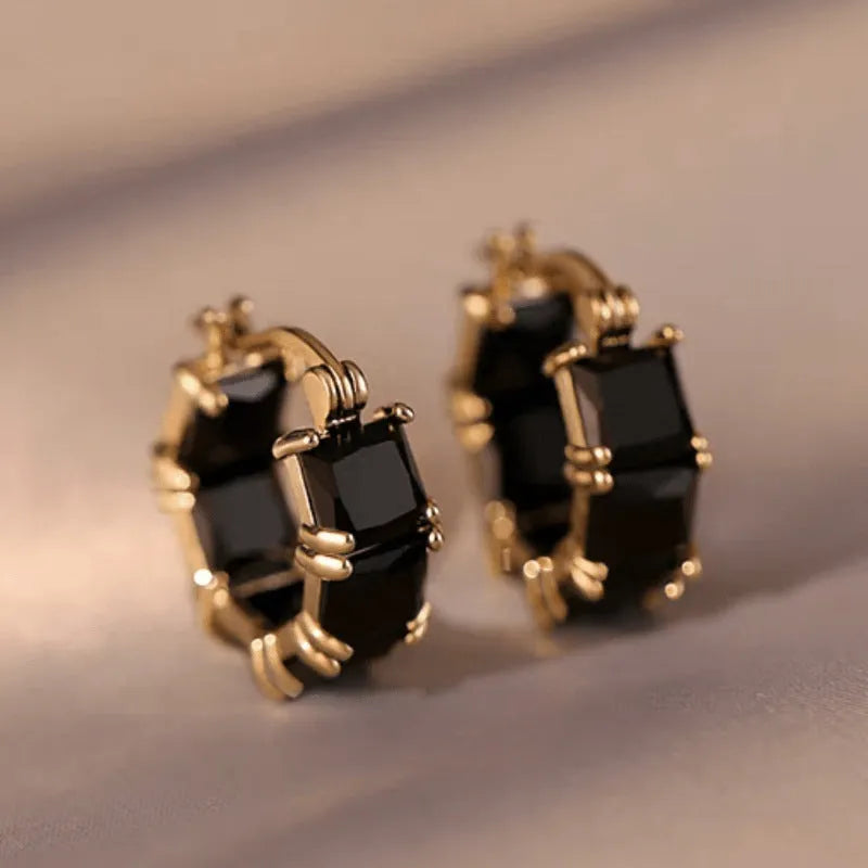 Fashionable geometric U-shaped ear rings with zircon stones and gold settings