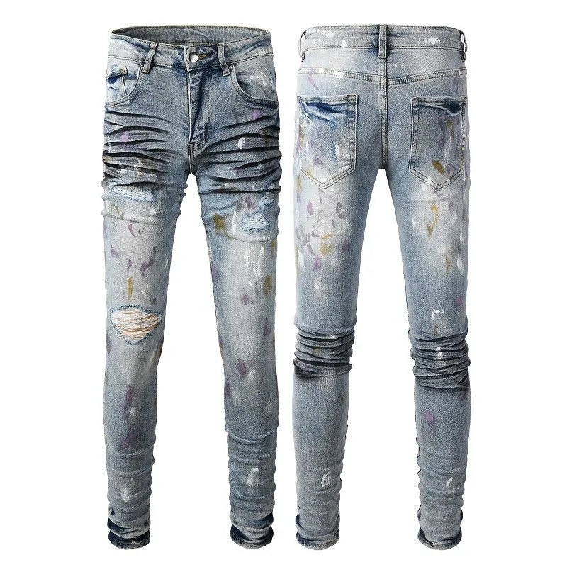 Men's slim fit ripped jeans in light blue with tapered cotton denim, zip fly and double layer belt waist