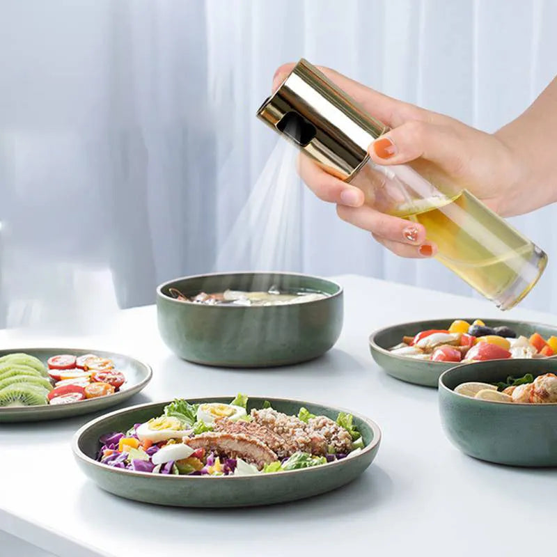 Gold push-type oil spray bottle with glass reservoir and ABS pump for BBQ and kitchen use