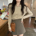 Women's beige knitted cardigan top with long sleeves and loose fit design