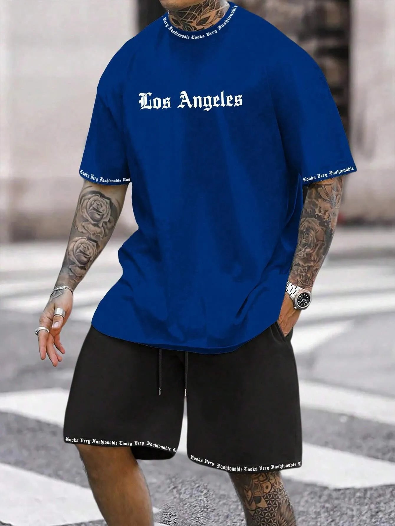 Men's blue printed short-sleeved top and matching shorts, a sports style co-ord set in quick-dry fabric.