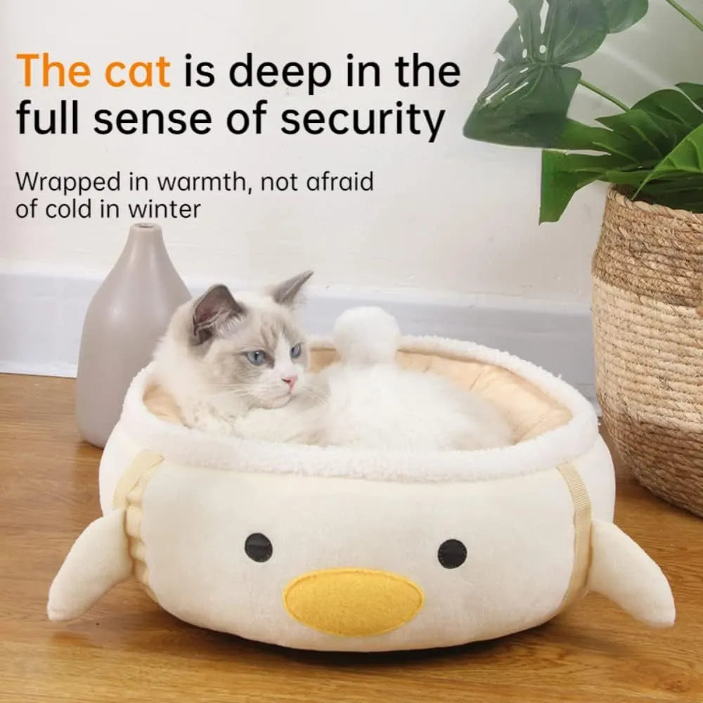 Green chick and dinosaur shaped plush cat bed shown both lying flat and hanging as a hammock.