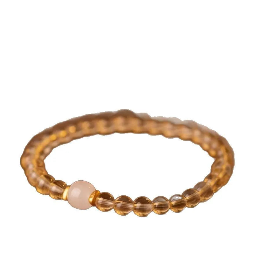 Handmade Putuo gold rutilated quartz bracelet with artificial crystal and pearl elements in Hotan Jade colours
