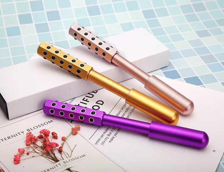 Purple germanium particle facial massage roller instrument approximately 193mm long