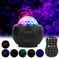 Mini laser light planet starry sky projection lamp with LED and laser sources, USB powered, black colour, showing star field effect